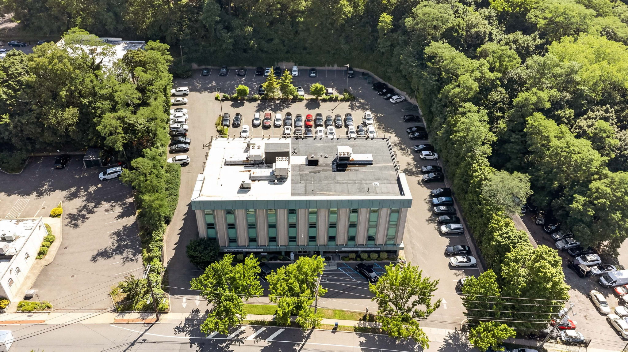 Elevated view of the building and surrounding parking