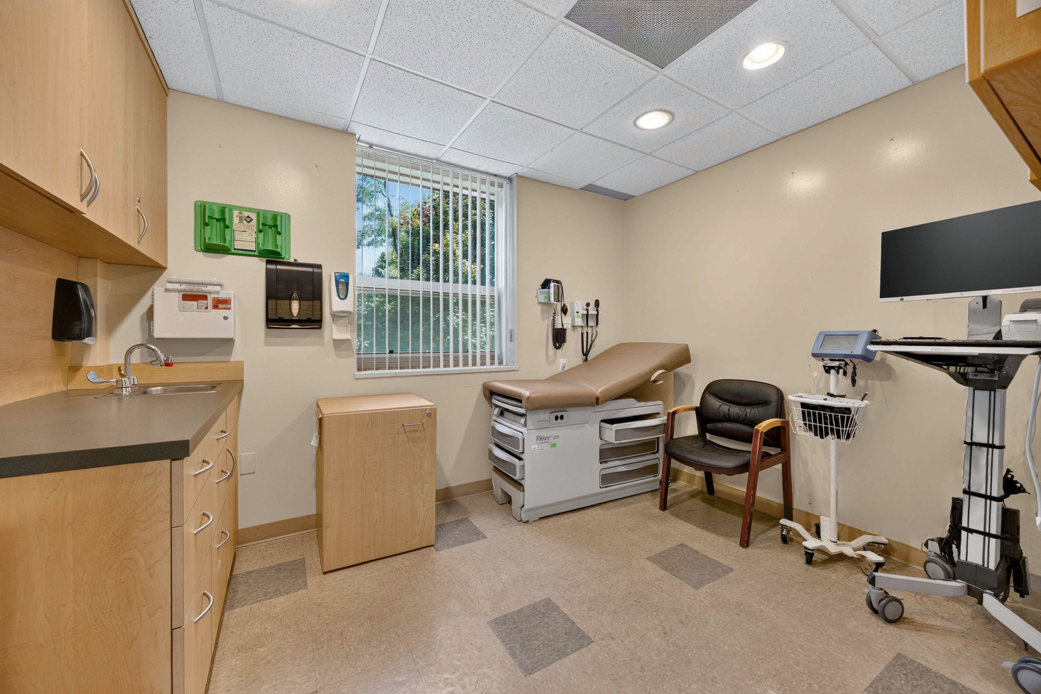 Equipped exam room in Suite 309